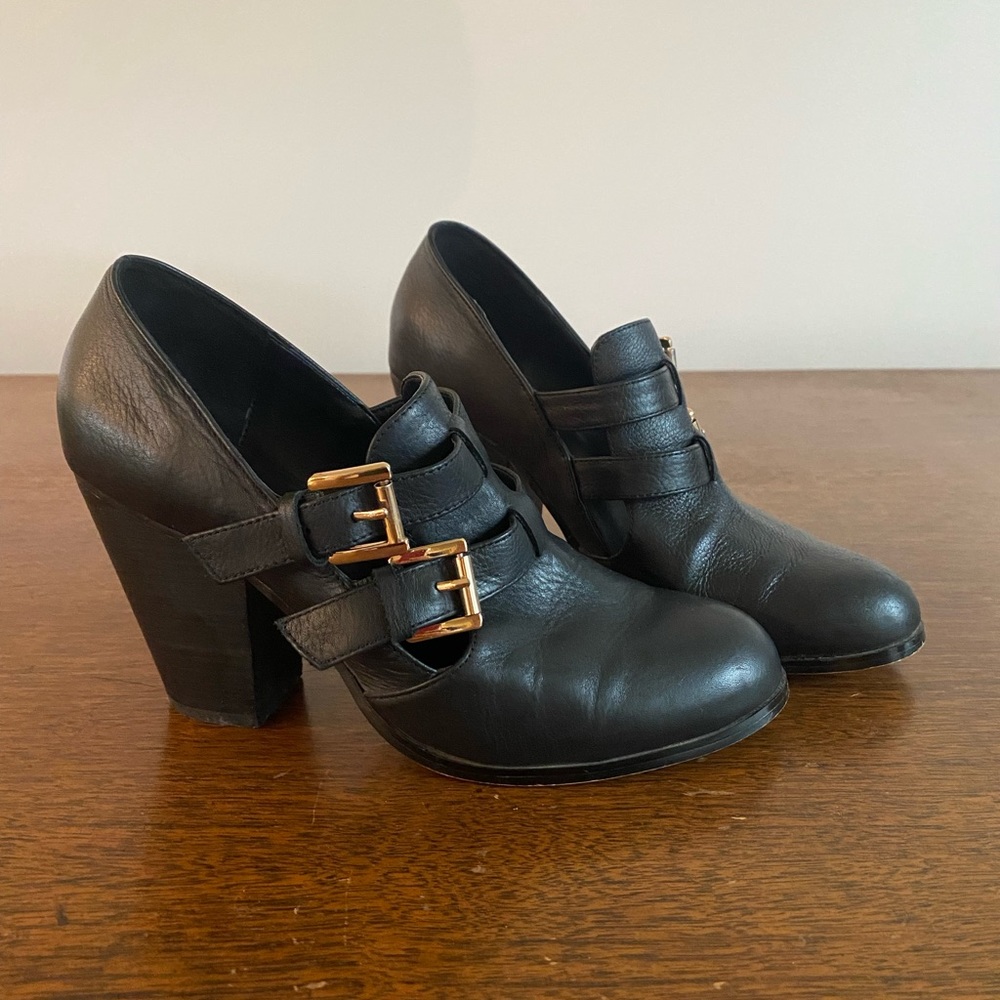 Aldo heels, black with gold buckles.